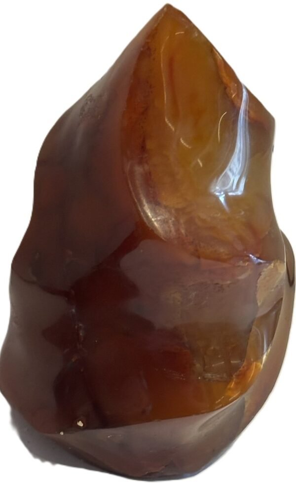 Carnelian flame 2 2 sians emporium Hand carved polished carnelian flame sculpture featuring twisting ridges with deep mahogany red burnt orange tones and smoky chalcedony patches isolated on a white background